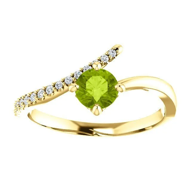 14KT GOLD 0.55 CT PERIDOT & 0.10 CTW DIAMOND ACCENT BYPASS RING
