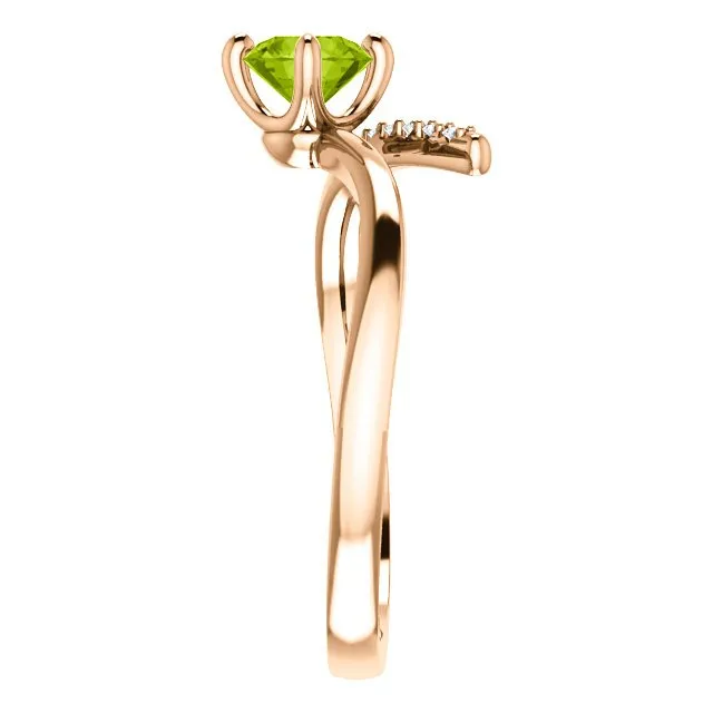 14KT GOLD 0.55 CT PERIDOT & 0.10 CTW DIAMOND ACCENT BYPASS RING