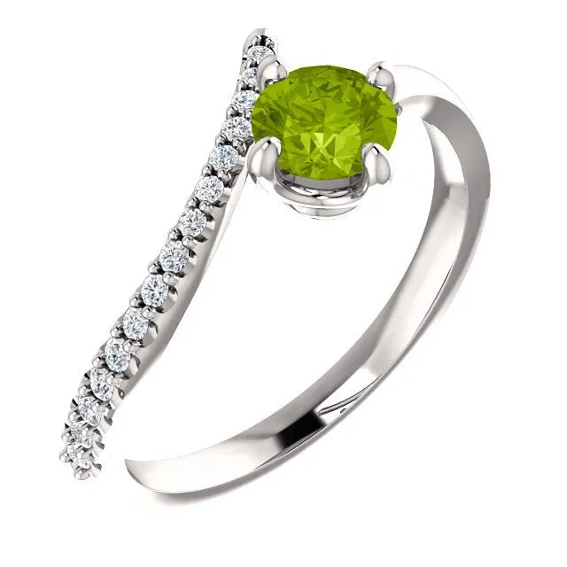 14KT GOLD 0.55 CT PERIDOT & 0.10 CTW DIAMOND ACCENT BYPASS RING