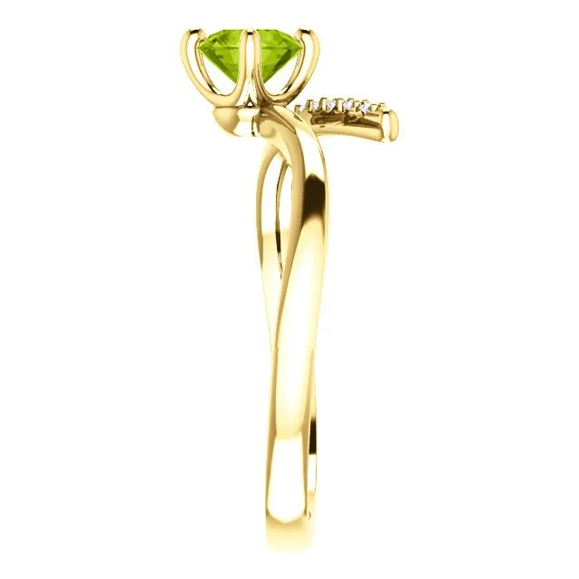 14KT GOLD 0.55 CT PERIDOT & 0.10 CTW DIAMOND ACCENT BYPASS RING
