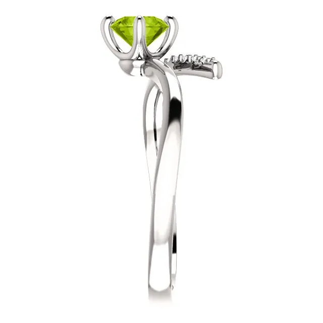 14KT GOLD 0.55 CT PERIDOT & 0.10 CTW DIAMOND ACCENT BYPASS RING