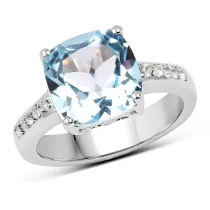 Blue Topaz Solitaire Ring with White Topaz Accents