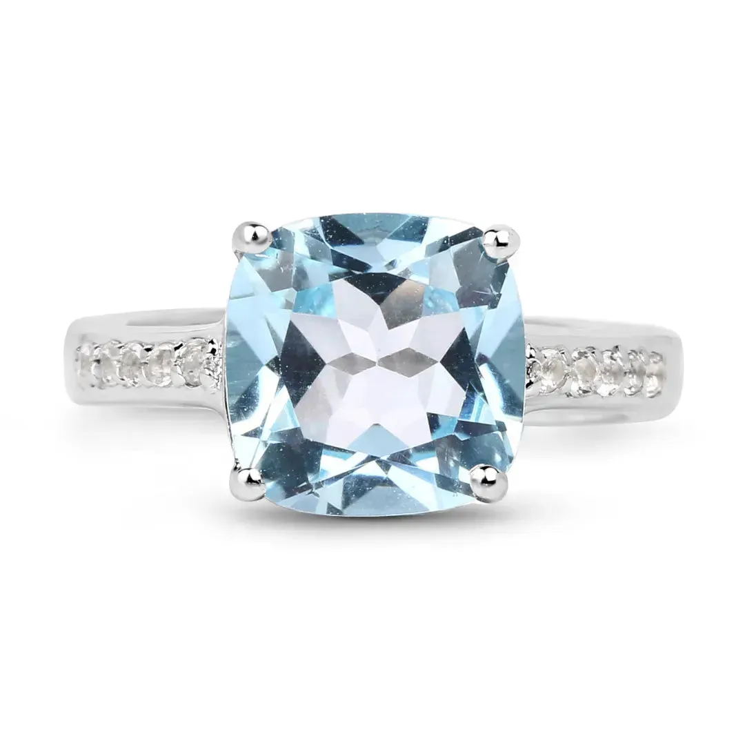 Blue Topaz Solitaire Ring with White Topaz Accents