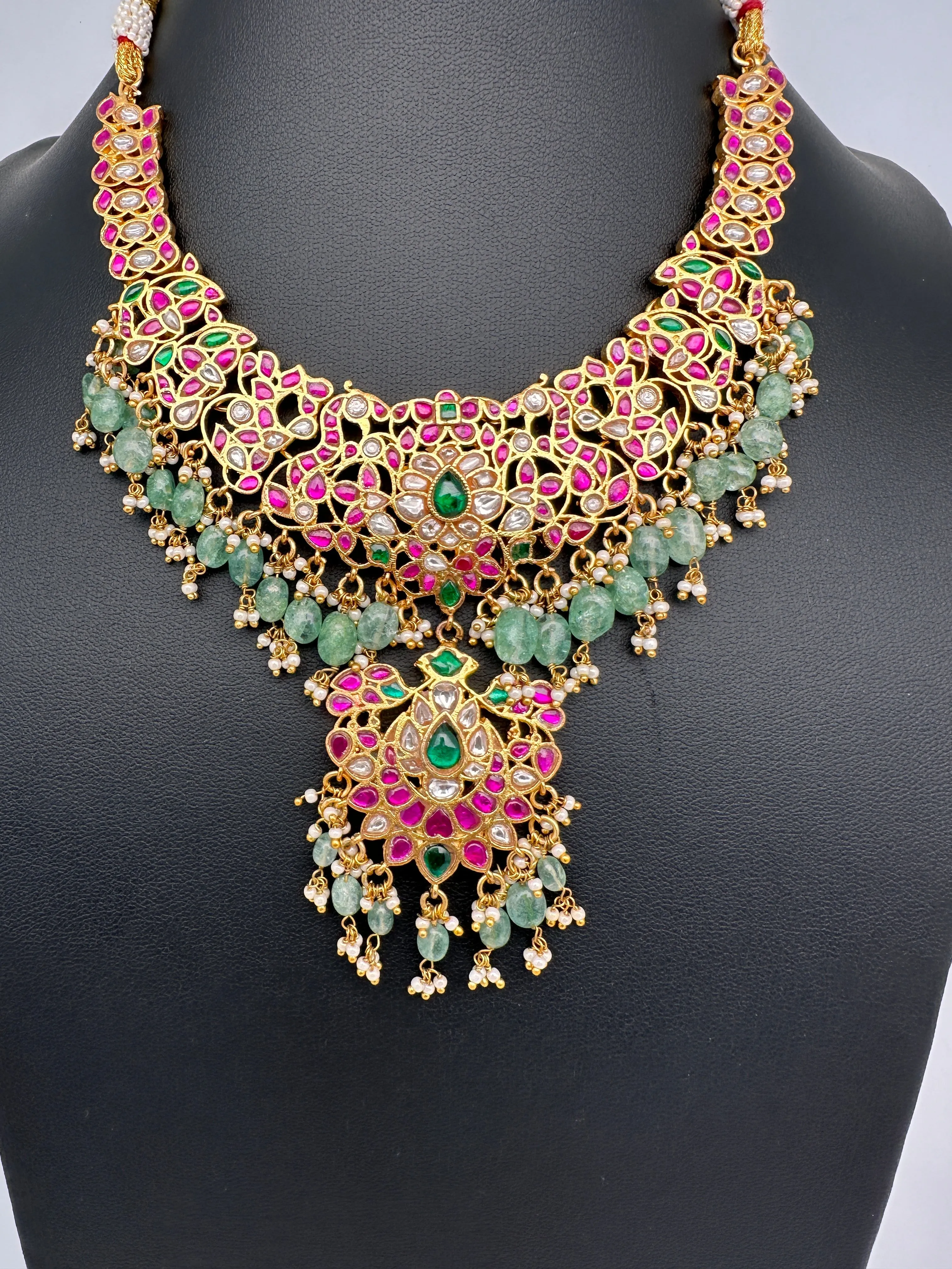 Jadau Kundan Daint Neckline Necklace with Green Emerald Beads
