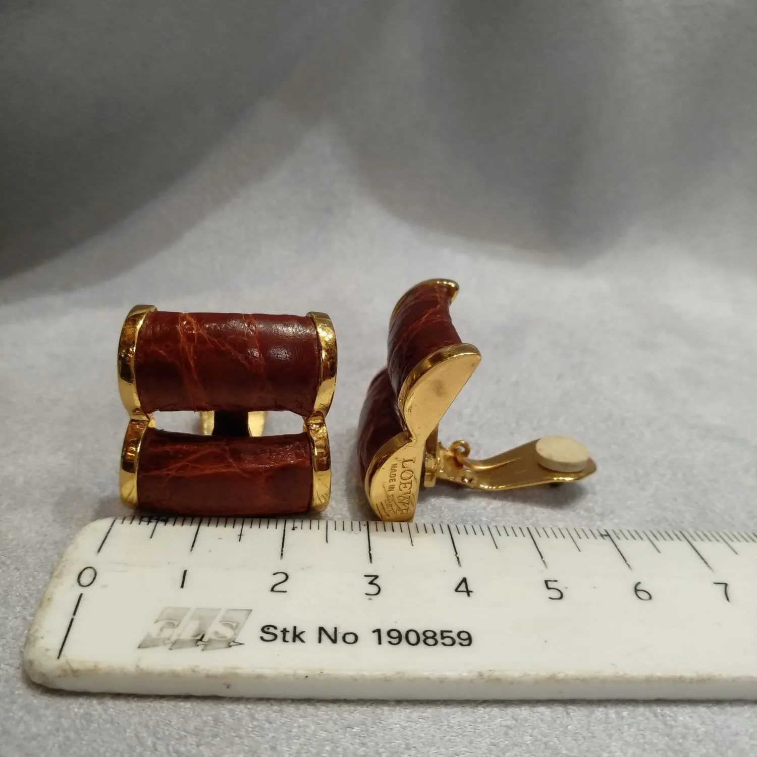 Loewe Brown leather earrings croc effect