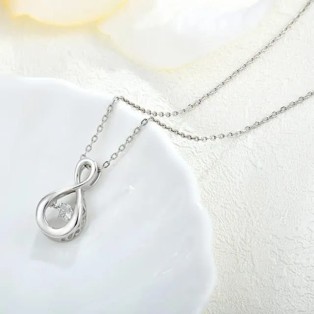 Silver necklace with dancing diamond necklace and moissanite